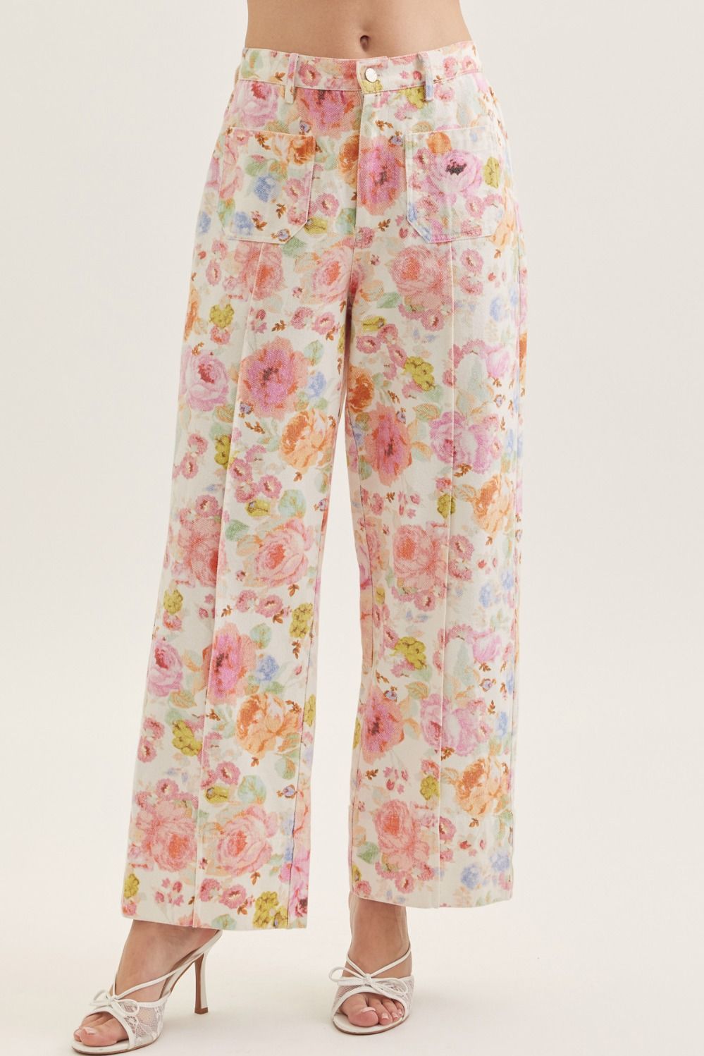 Botanical print wide leg pants featuring front patch pockets