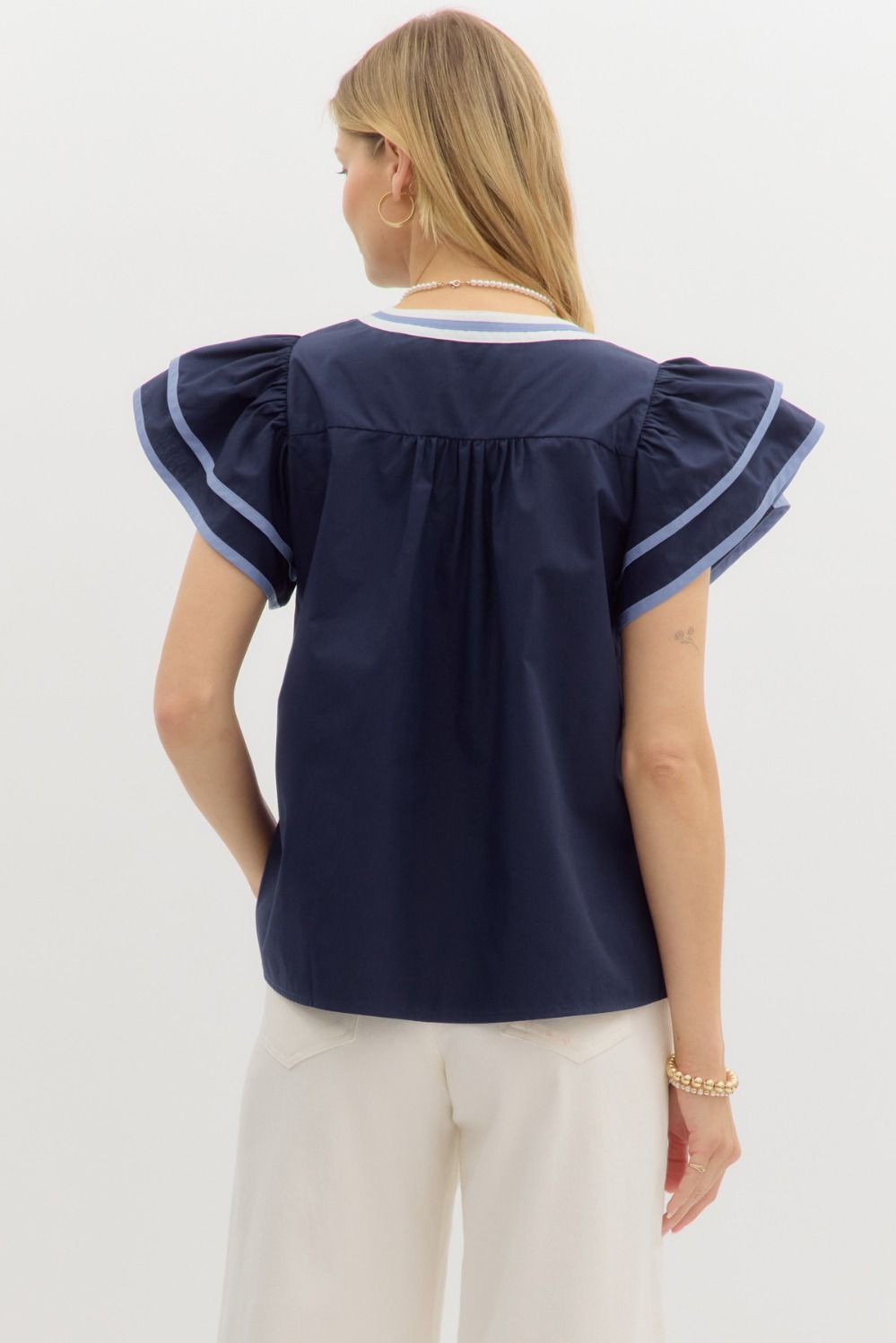 Solid flutter sleeve mutlicolor accent V-neck top