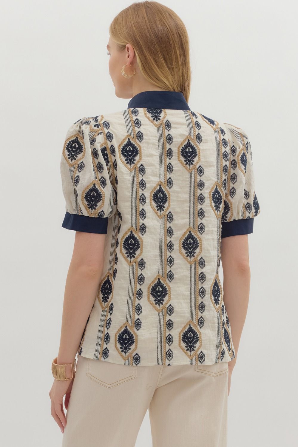 Abstract pattern embroidered short puff sleeve top