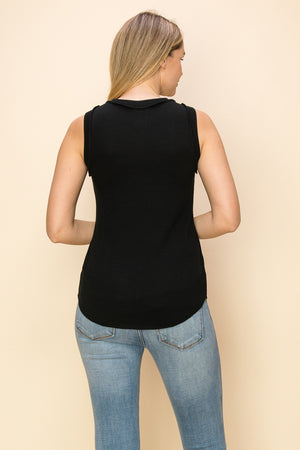 Eyelet and stud embellished crew neck top