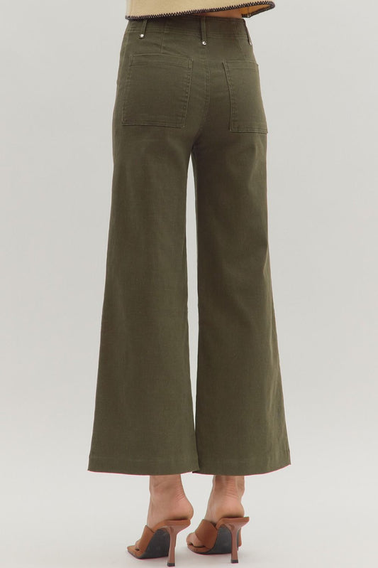 Solid high rise wide leg pants featuring front seam detail