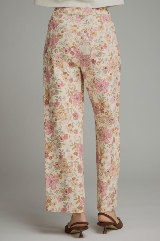 Floral print pants featuring front seam detail