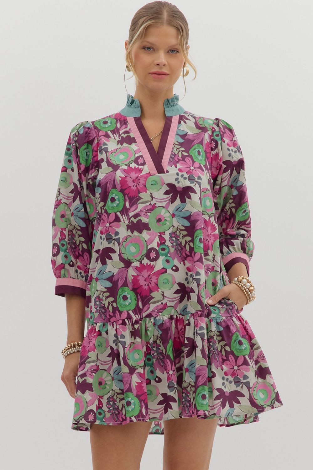Multi-floral pattern ¾ sleeve ruffle hem mini dress featuring multicolor band