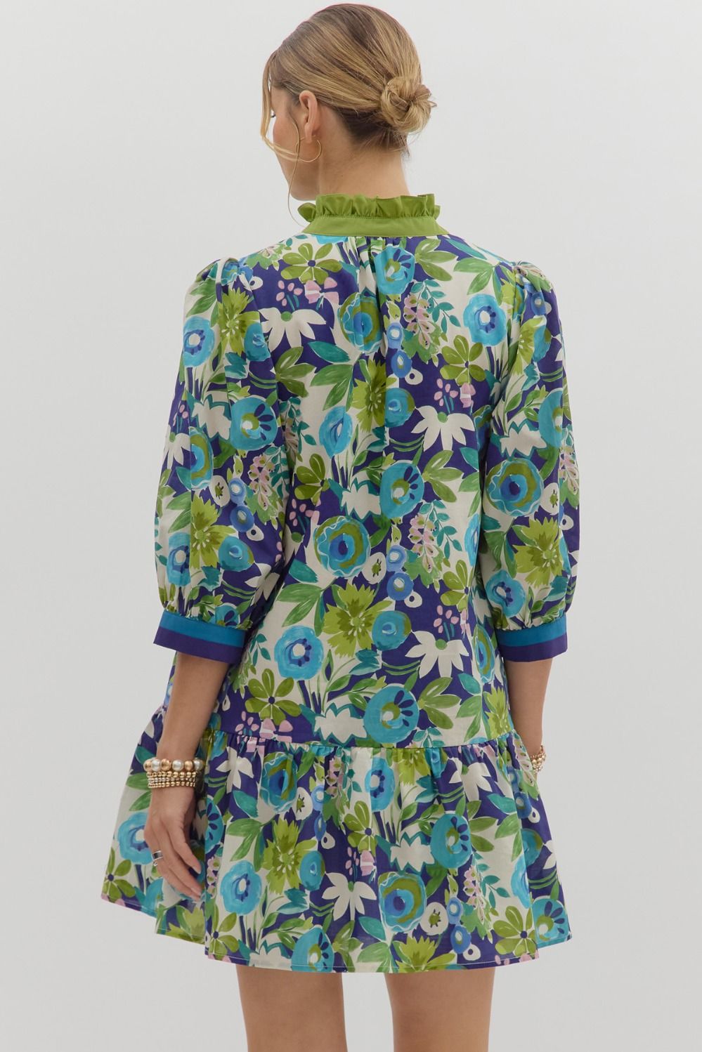 Multi-floral pattern ¾ sleeve ruffle hem mini dress featuring multicolor band