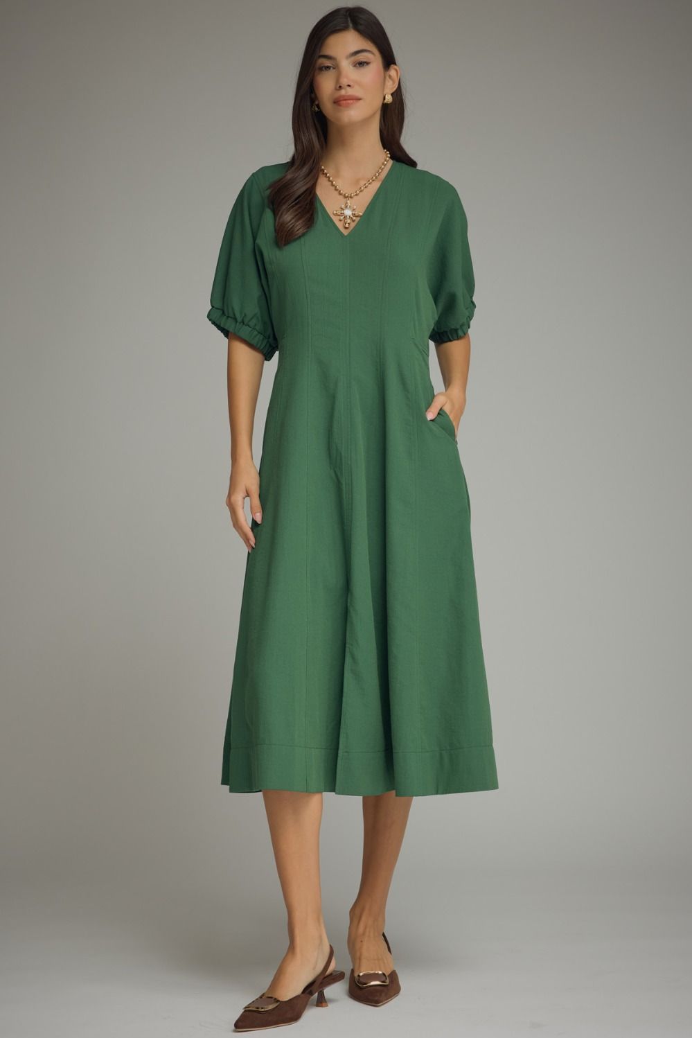 Solid short puff sleeve midi dress featuring a V-neckline