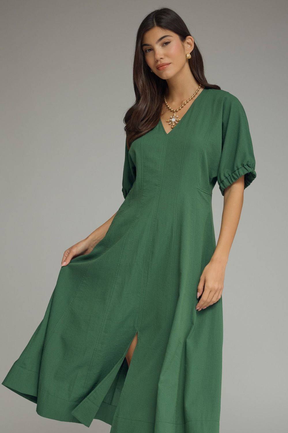 Solid short puff sleeve midi dress featuring a V-neckline