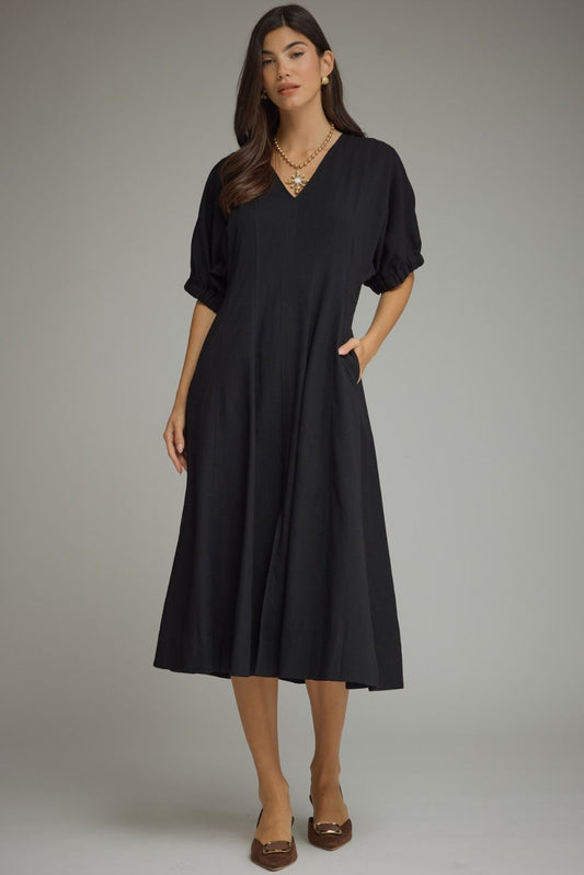 Solid short puff sleeve midi dress featuring a V-neckline