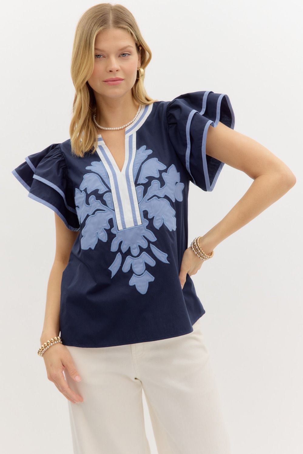 Solid flutter sleeve mutlicolor accent V-neck top