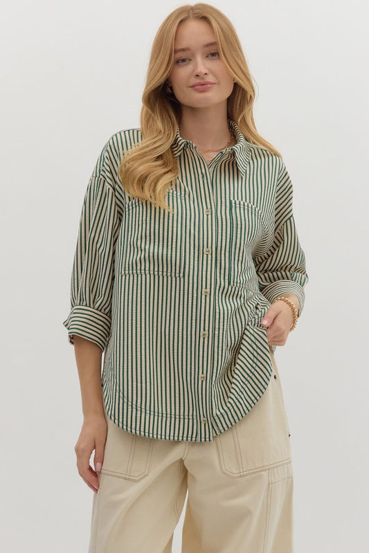 Textured stripe pattern reverse cuff ¾ sleeve shirt. Double shirt pockets at front