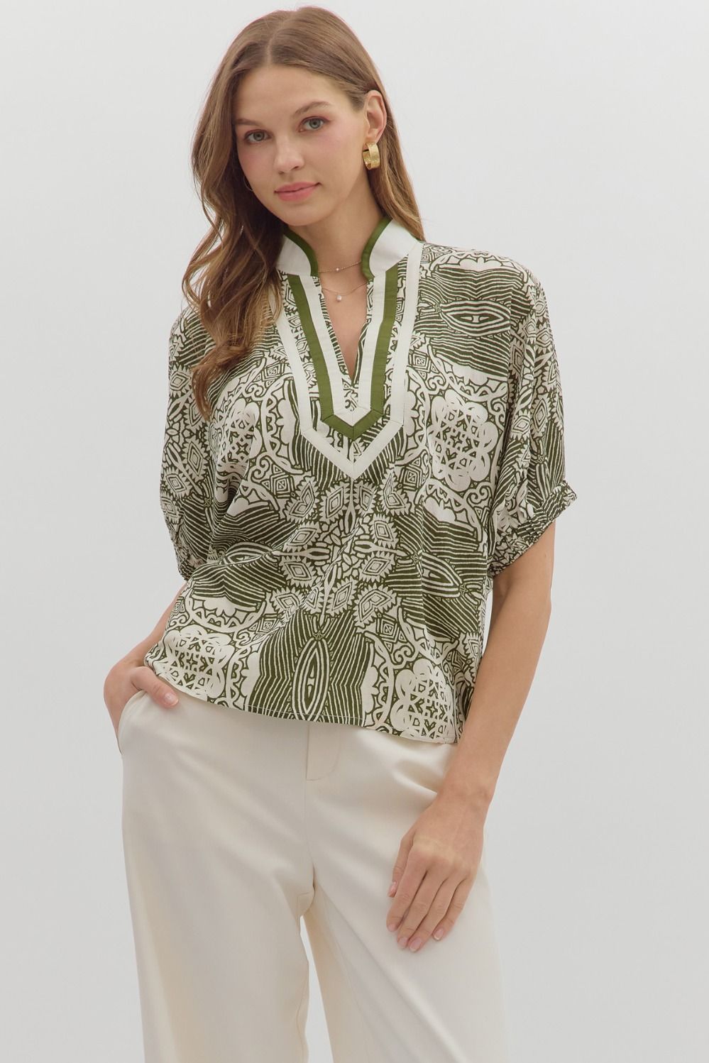 Multi-pattern short dolman sleeve top featuring multicolor
