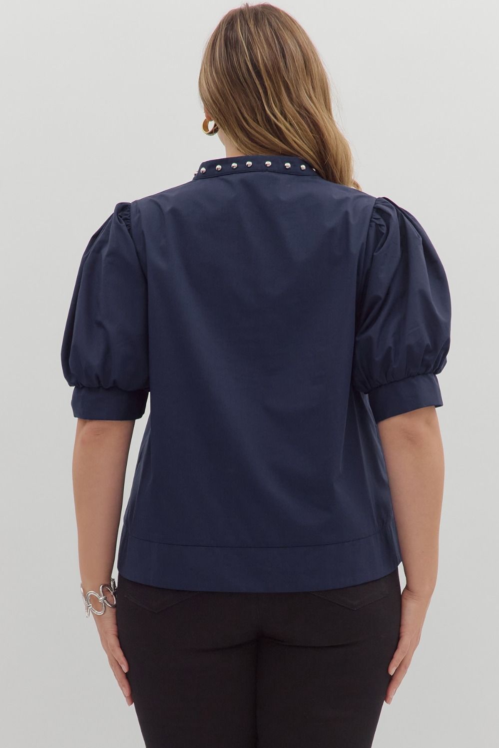 Solid cuff band short puff sleeve pullover top featuring stud accent detail
