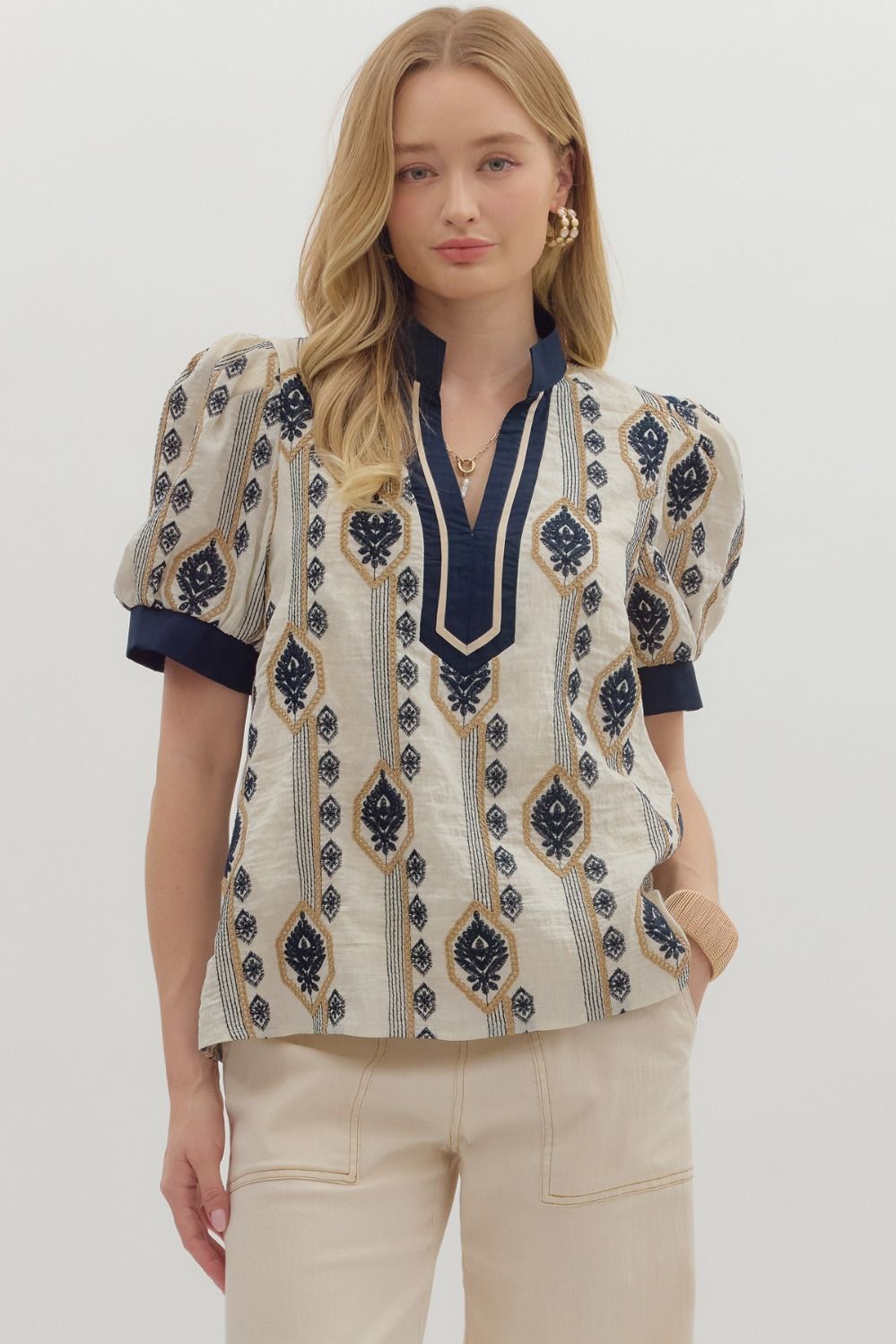 Abstract pattern embroidered short puff sleeve top