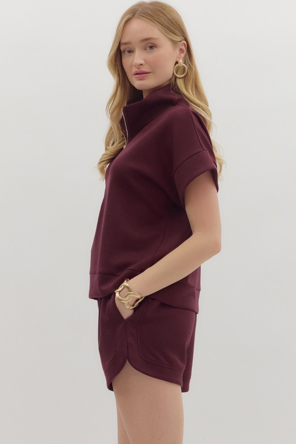 Solid zip-front high neck closure pullover top